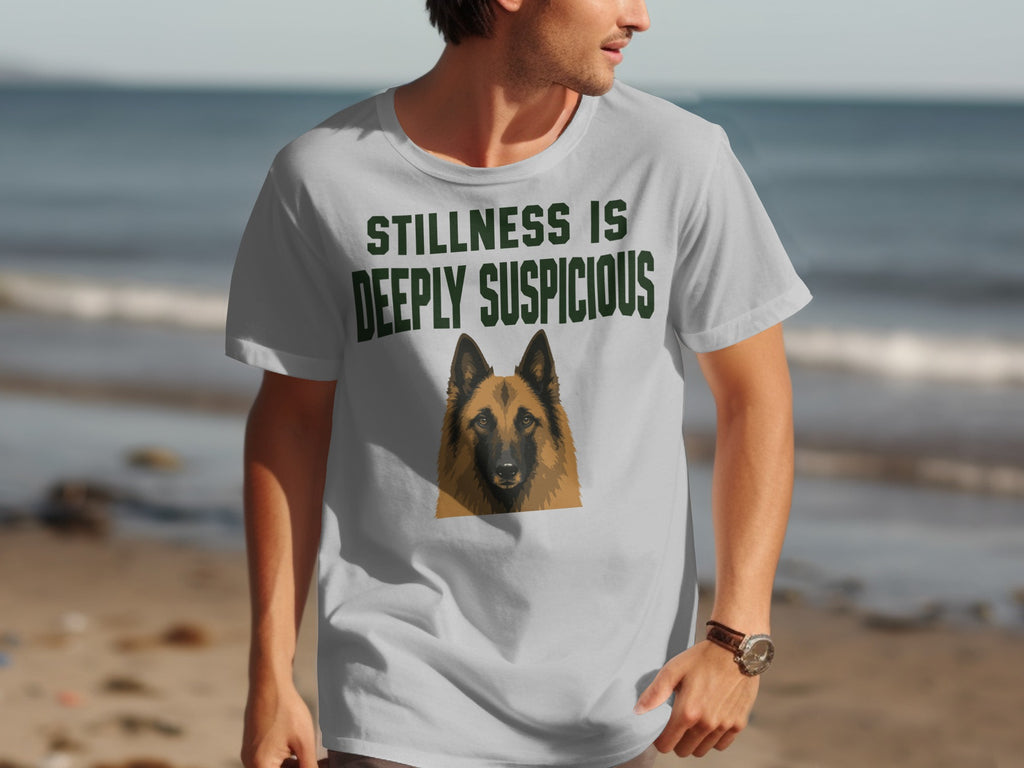 T-shirt with German Shepherd portrait and "Stillness is deeply suspicious" text.