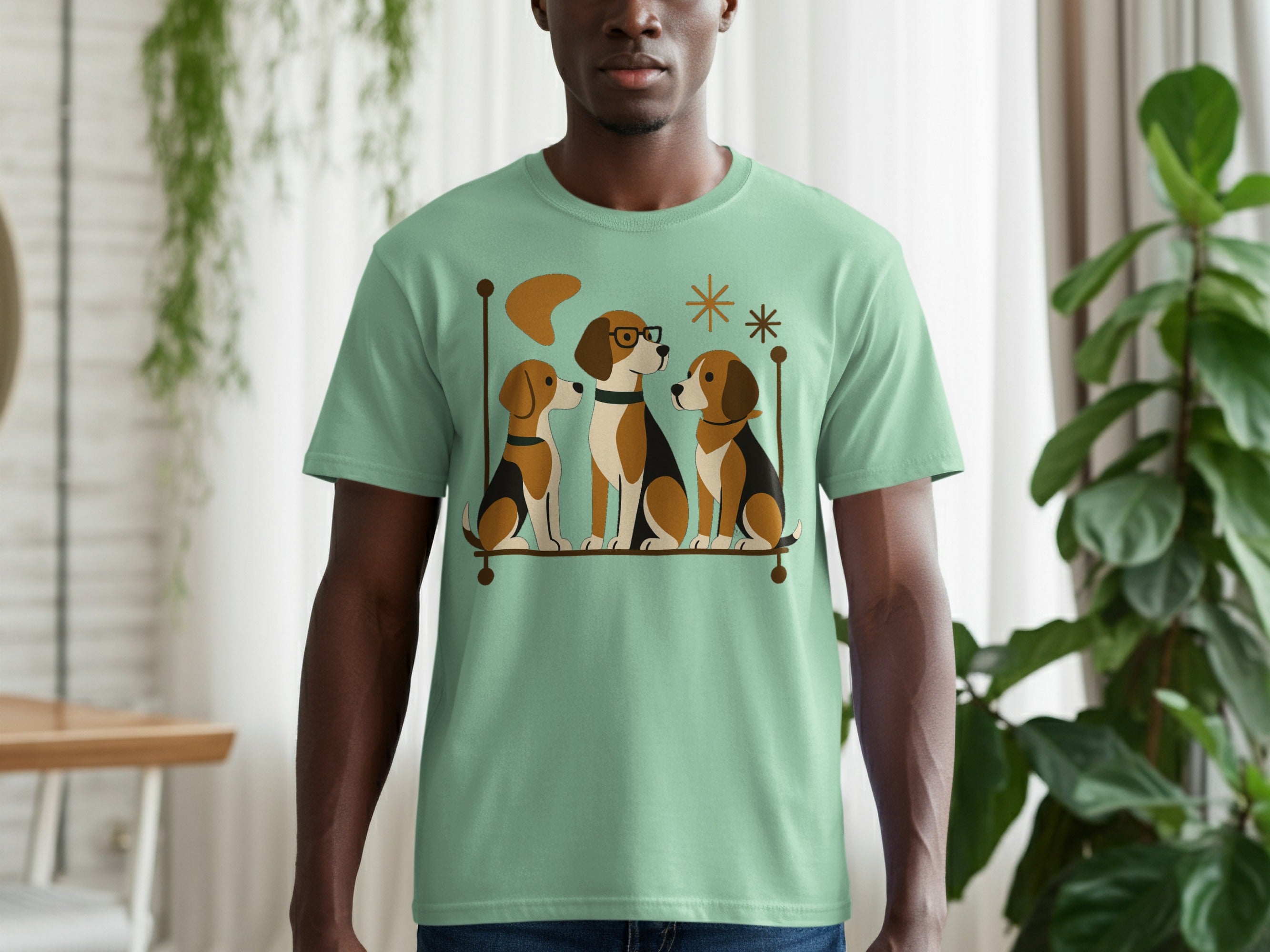 T-shirt with a graphic of three beagles sitting on a perch with retro style elements.