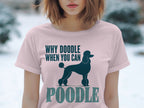 Pale pink t-shirt with "WHY DOODLE WHEN YOU CAN POODLE" and poodle silhouette.