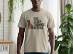 Tan t-shirt with "EAT. SLEEP. ZOOMIES. REPEAT." text and dog graphic.