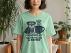 Light green t-shirt with a schnauzer and coffee cup graphic and text.