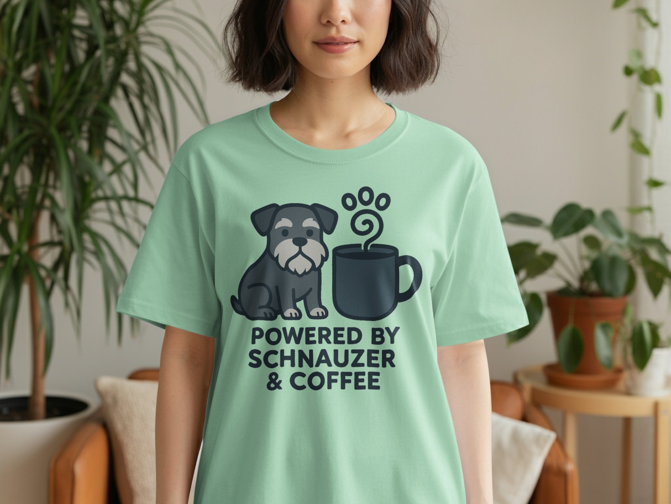 Light green t-shirt with a schnauzer and coffee cup graphic and text.