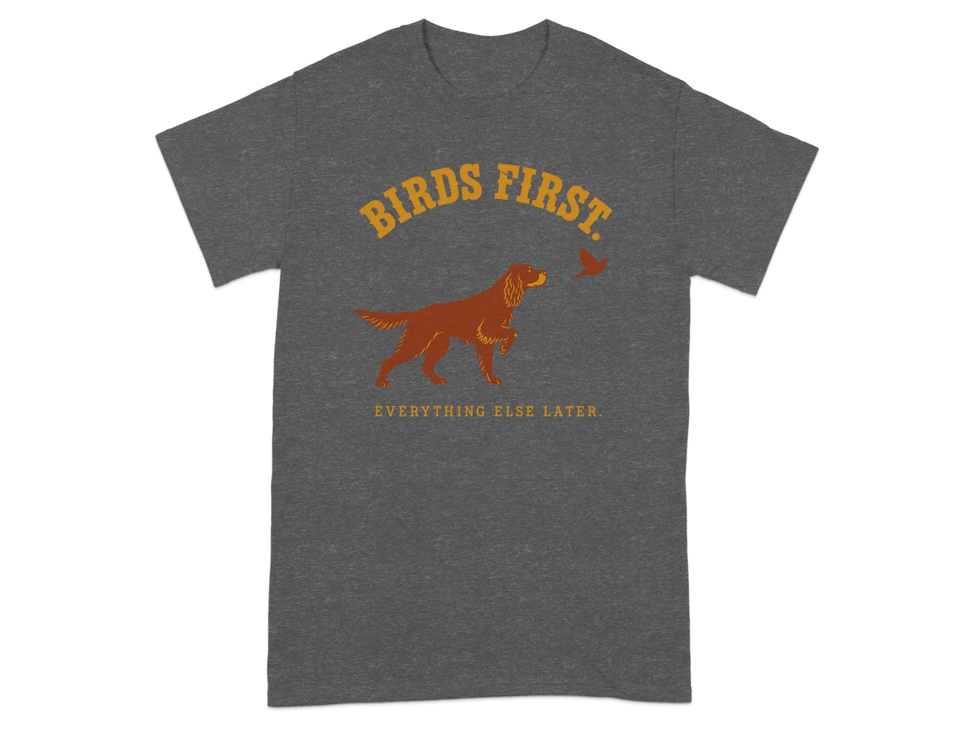 Dark gray t-shirt with "BIRDS FIRST. EVERYTHING ELSE LATER." and a dog and bird graphic.
