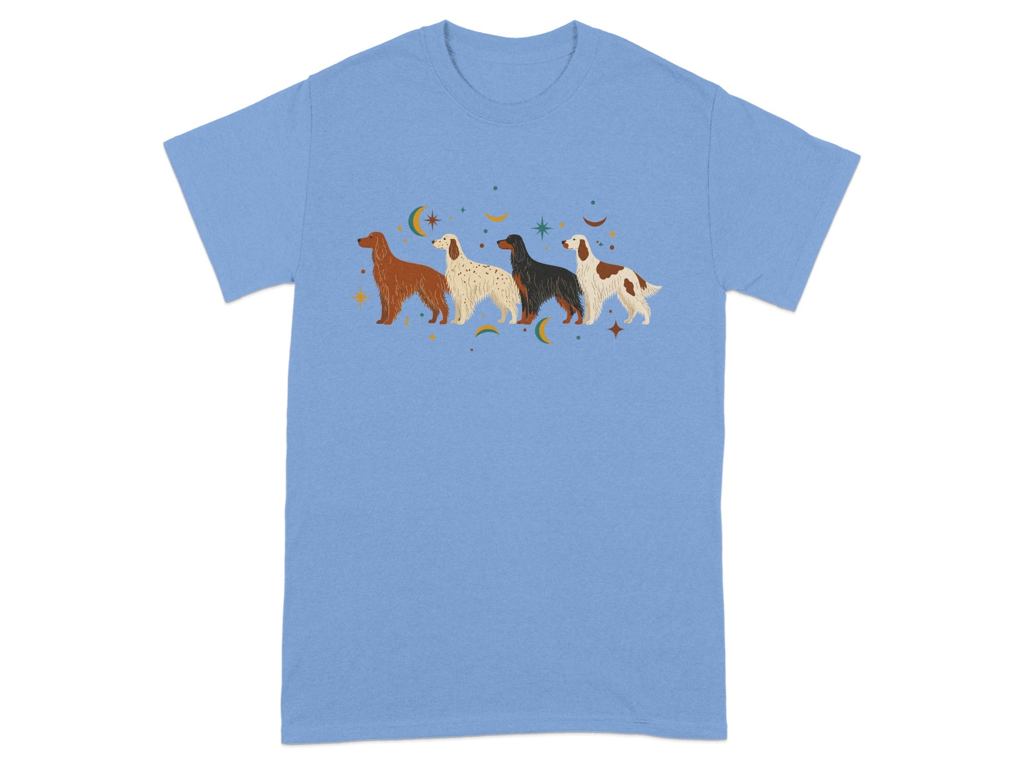 Light blue t-shirt with four stylized dogs and celestial motifs.