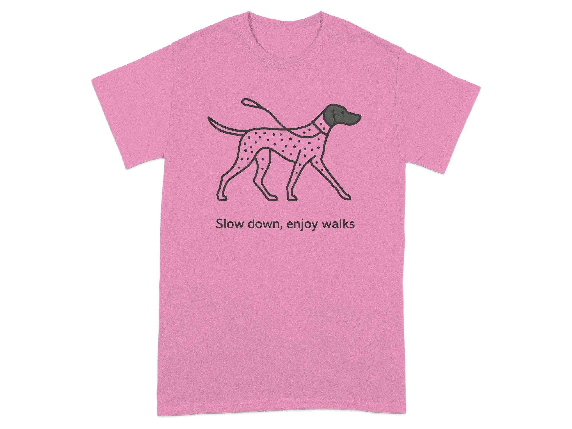 Pink t-shirt with a Dalmatian illustration and text "Slow down, enjoy walks".