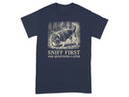T-shirt with a beagle in a hat sniffing the ground.