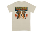 Beige t-shirt with a distressed dog face and "Mentally busy since sunrise" text.