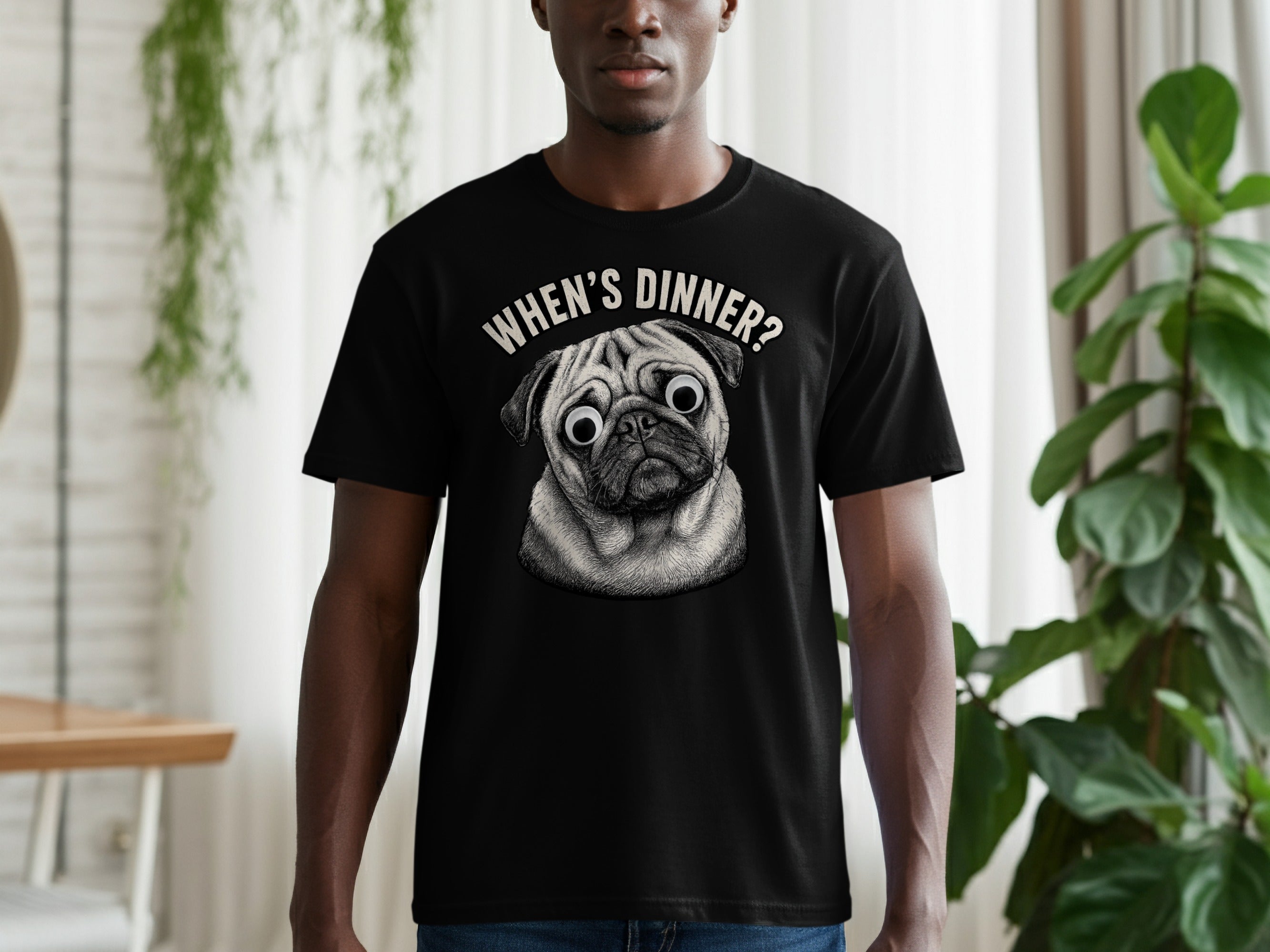 Black t-shirt with a pug graphic and the text "WHEN'S DINNER?"