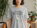 Gray t-shirt with "Life Update: someone walked past the house!" text and dog graphic.