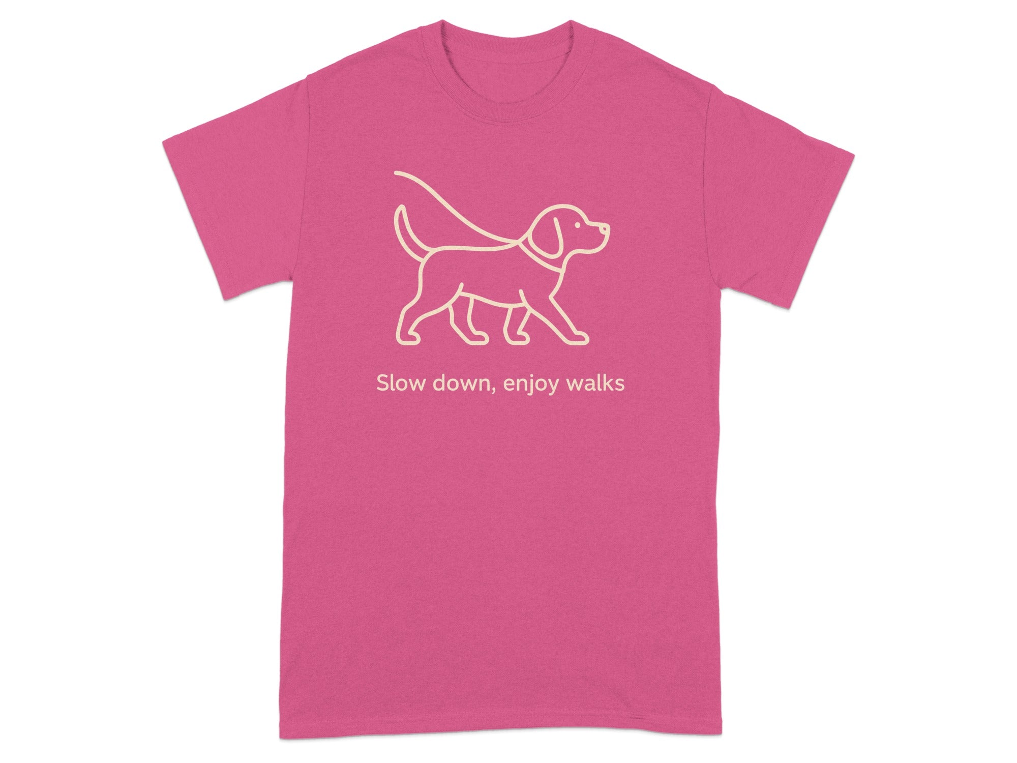Pink t-shirt with a line drawing of a dog and the text "Slow down, enjoy walks".