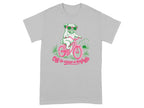 Pug on a pink bicycle, wearing sunglasses, with text "Off to cause a kerfuffle".