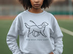 Light gray sweatshirt with a line drawing of a dog and the text "Slow down, enjoy walks."
