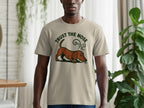 Tan t-shirt featuring a brown dachshund and text "TRUST THE NOSE".