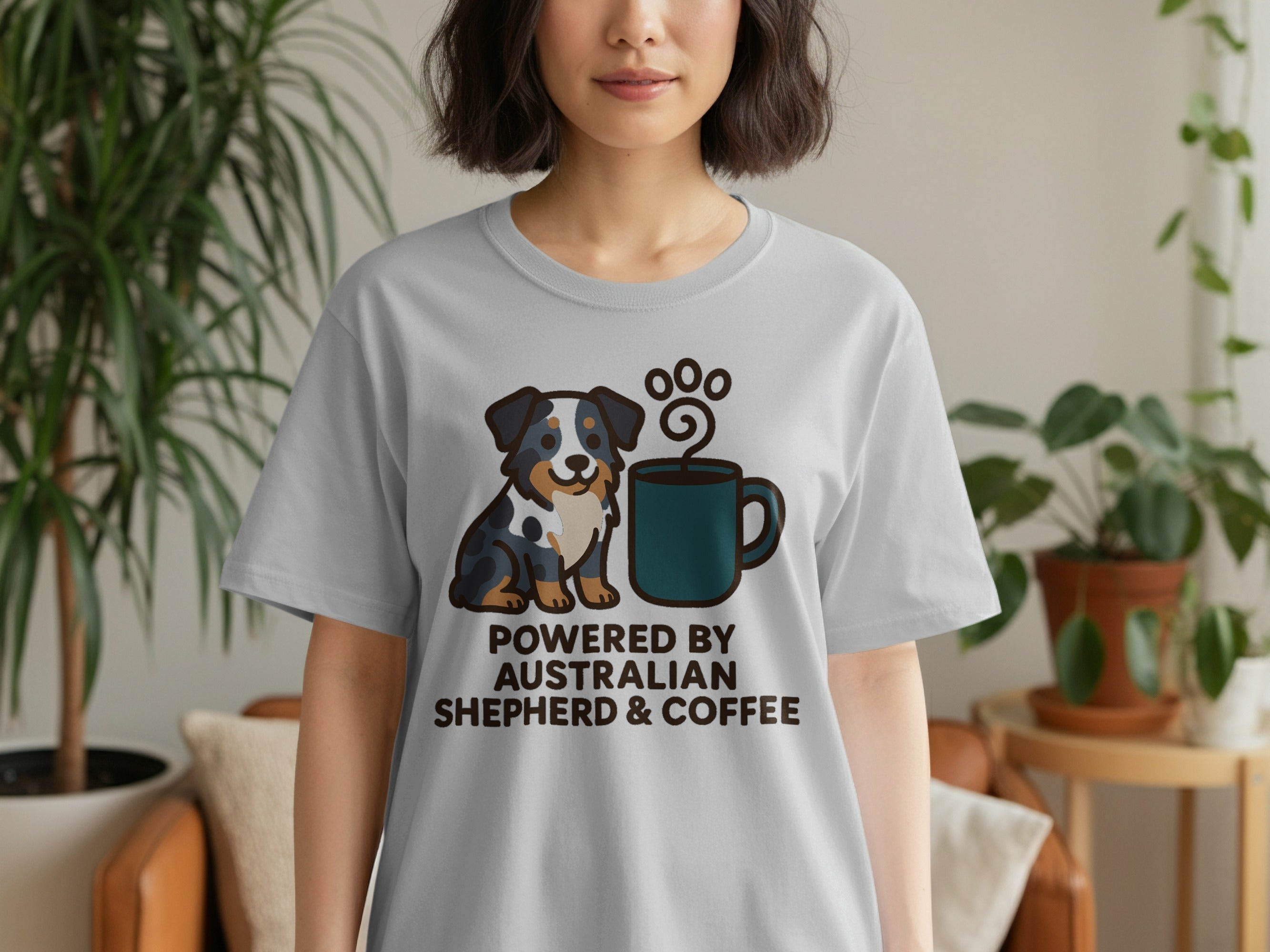 Grey t-shirt with cartoon Australian Shepherd and coffee cup, "Powered by Australian Shepherd & Coffee".