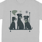 Three schnauzers sit on a shelf with decorative shapes and stars above them.