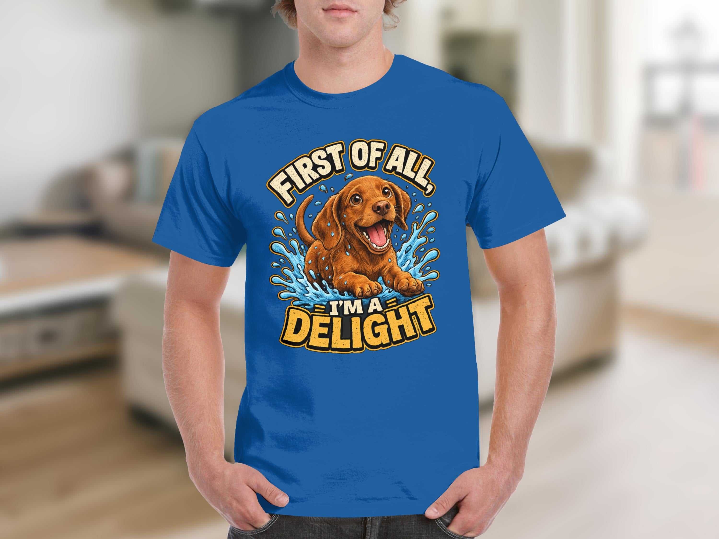 Blue t-shirt with joyful dog splashing water and text "FIRST OF ALL, I'M A DELIGHT".