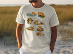 White t-shirt with a pattern of cartoon corgis fishing and interacting with fish.