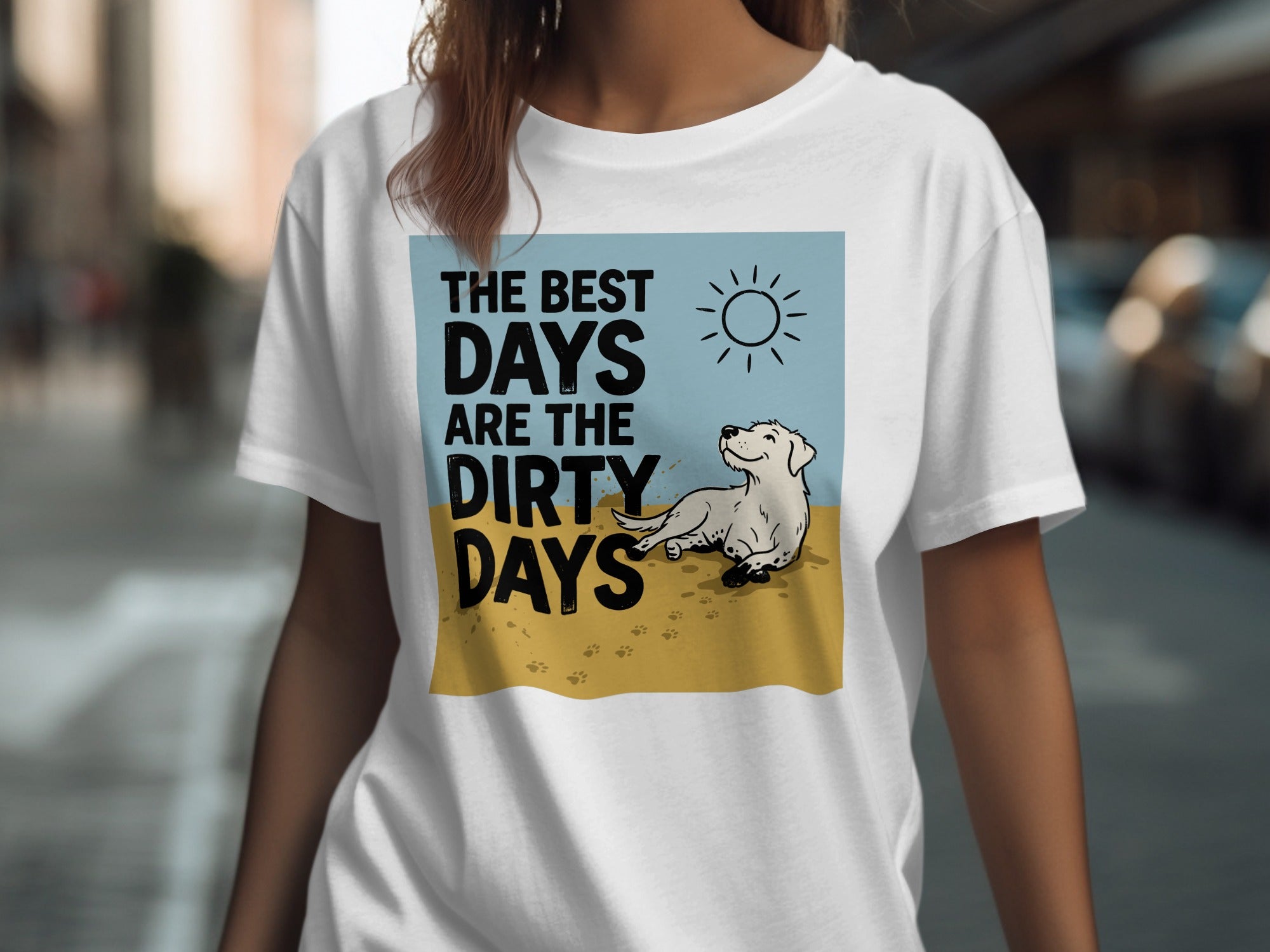 White t-shirt with "The Best Days Are The Dirty Days" text and a sun.