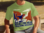 Green t-shirt with dog graphic and text "WALK? YOU MEAN TRACKING MISSION!"