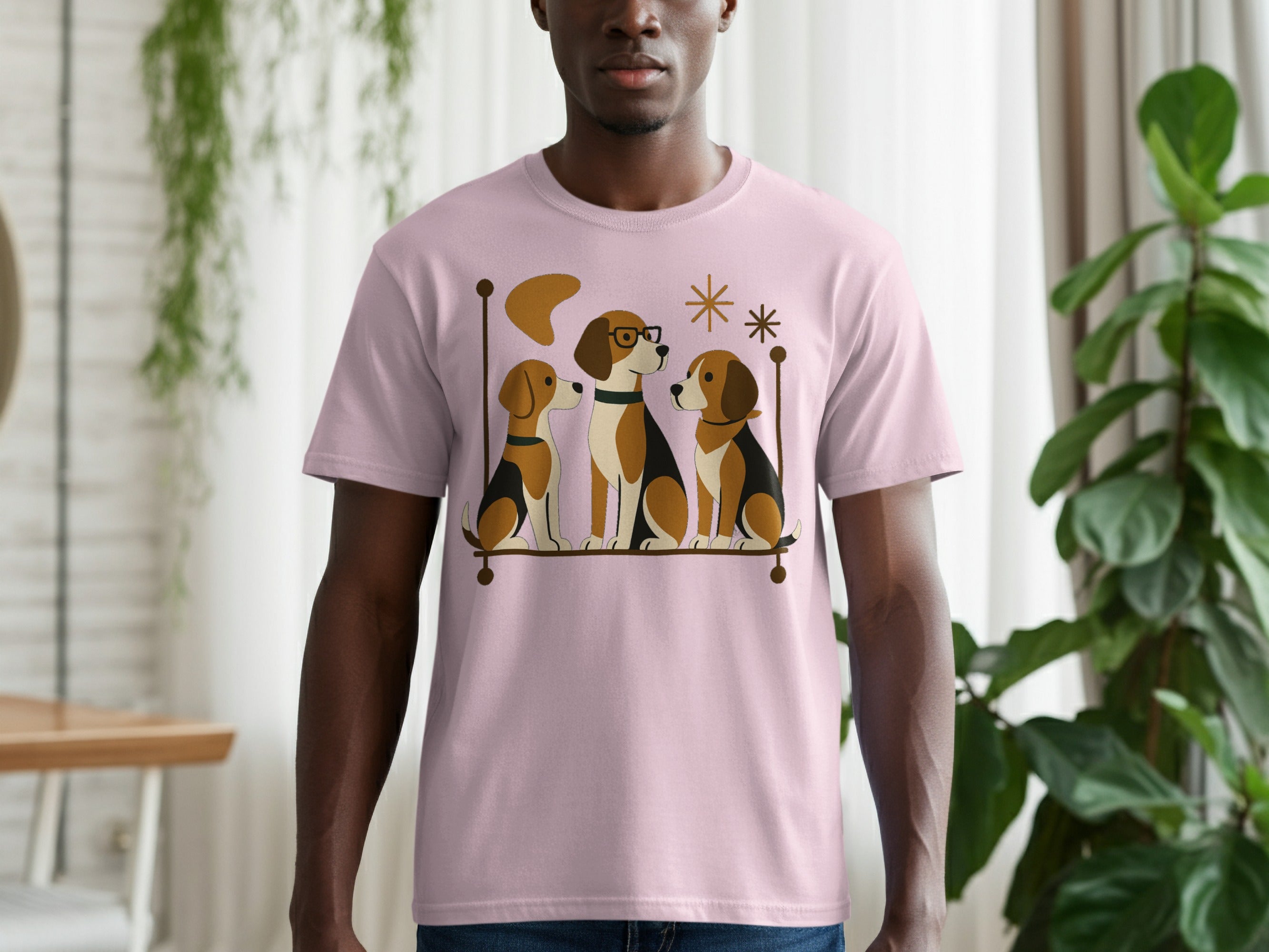 Pink t-shirt with a graphic of three beagles sitting on a perch with retro accents.