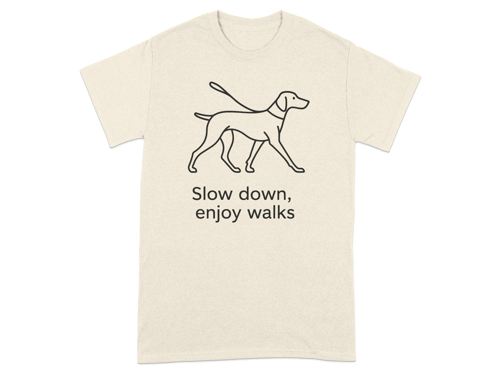 T-shirt with line drawing of a dog on a leash and text "Slow down, enjoy walks."