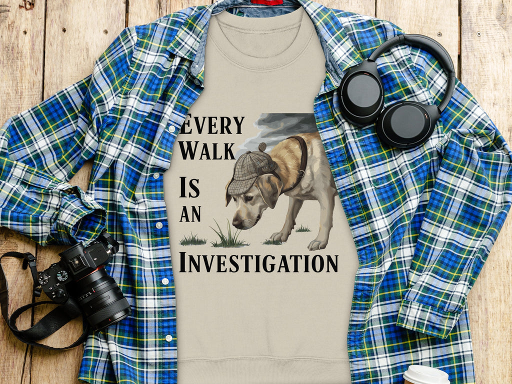 T-shirt with a dog in a hat, text "EVERY WALK IS AN INVESTIGATION."