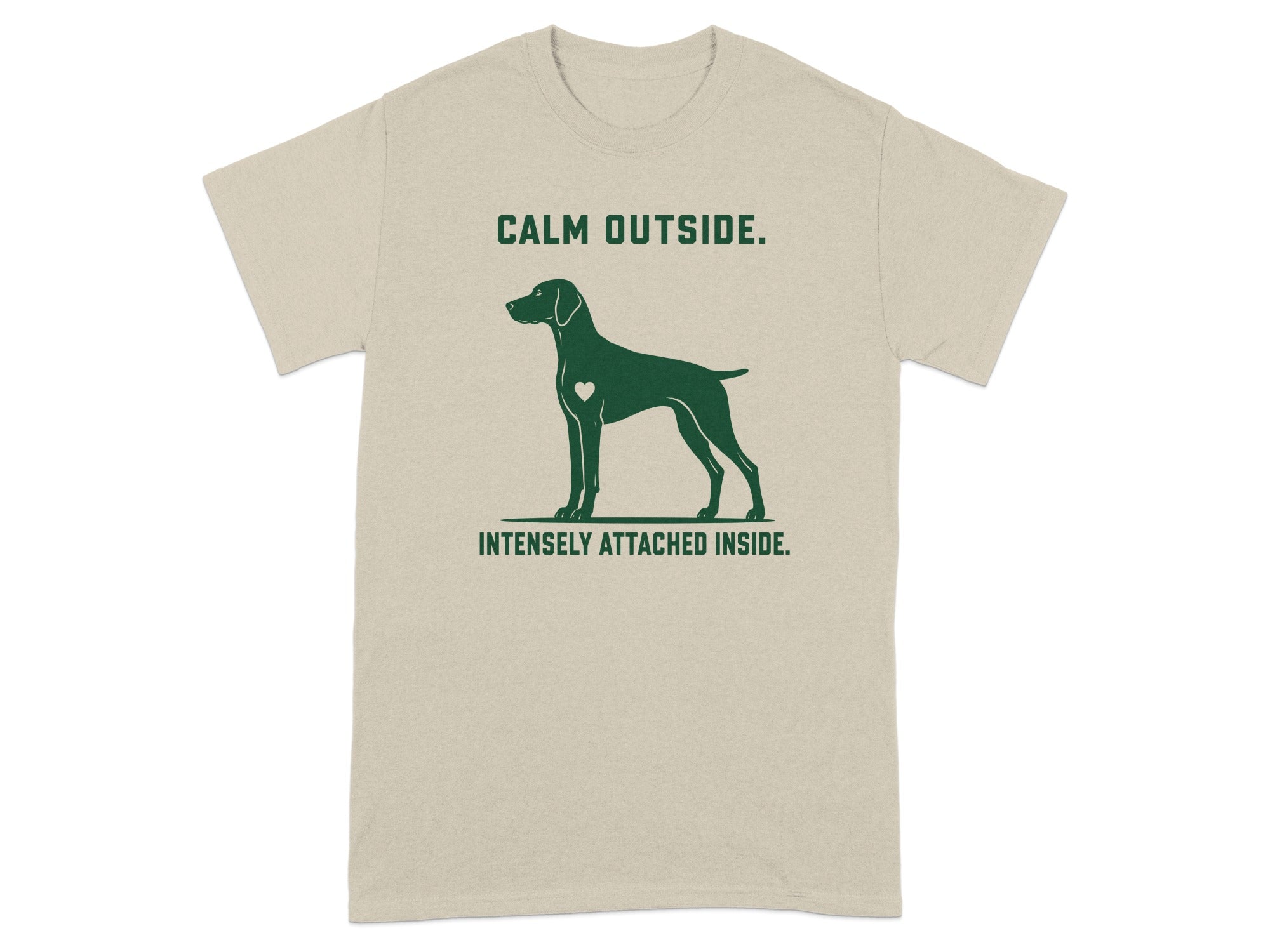 Beige t-shirt with a dog silhouette and text "Calm Outside. Intensely Attached Inside."
