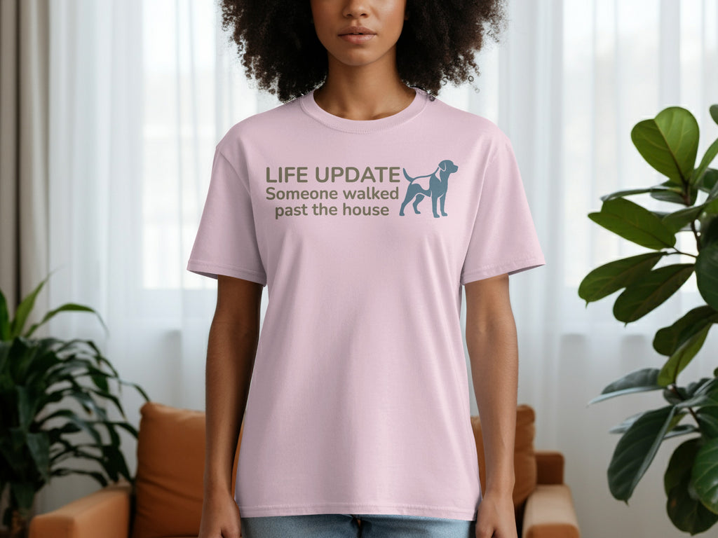 Light pink t-shirt with "LIFE UPDATE Someone walked past the house" and a dog silhouette.