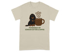 Gordon Setter dog sitting by a coffee cup with steam.