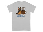 German Shepherd sitting next to a steaming coffee mug with "Powered by GSD & COFFEE" text.