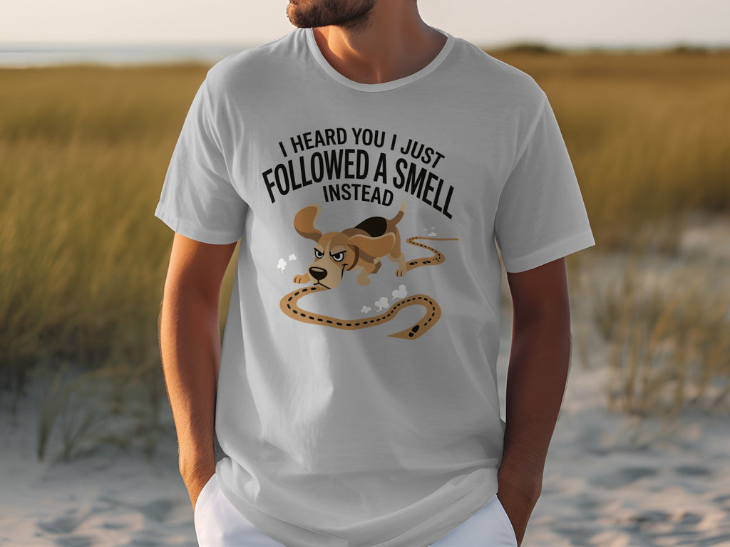 T-shirt with cartoon dog and text "I heard you I just followed a smell instead".