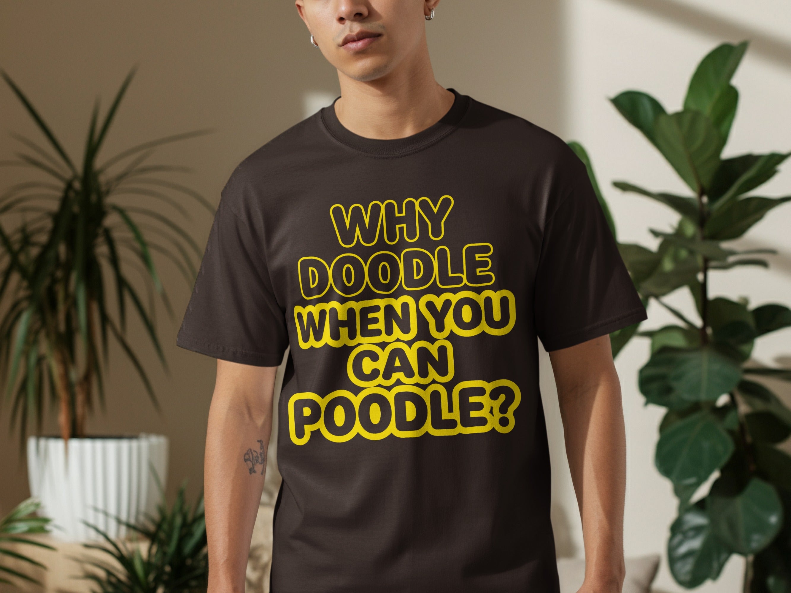 Dark t-shirt with yellow text "WHY DOODLE WHEN YOU CAN POODLE?".