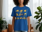Blue t-shirt with cartoon yellow puppies sewing and playing with quilts and yarn.