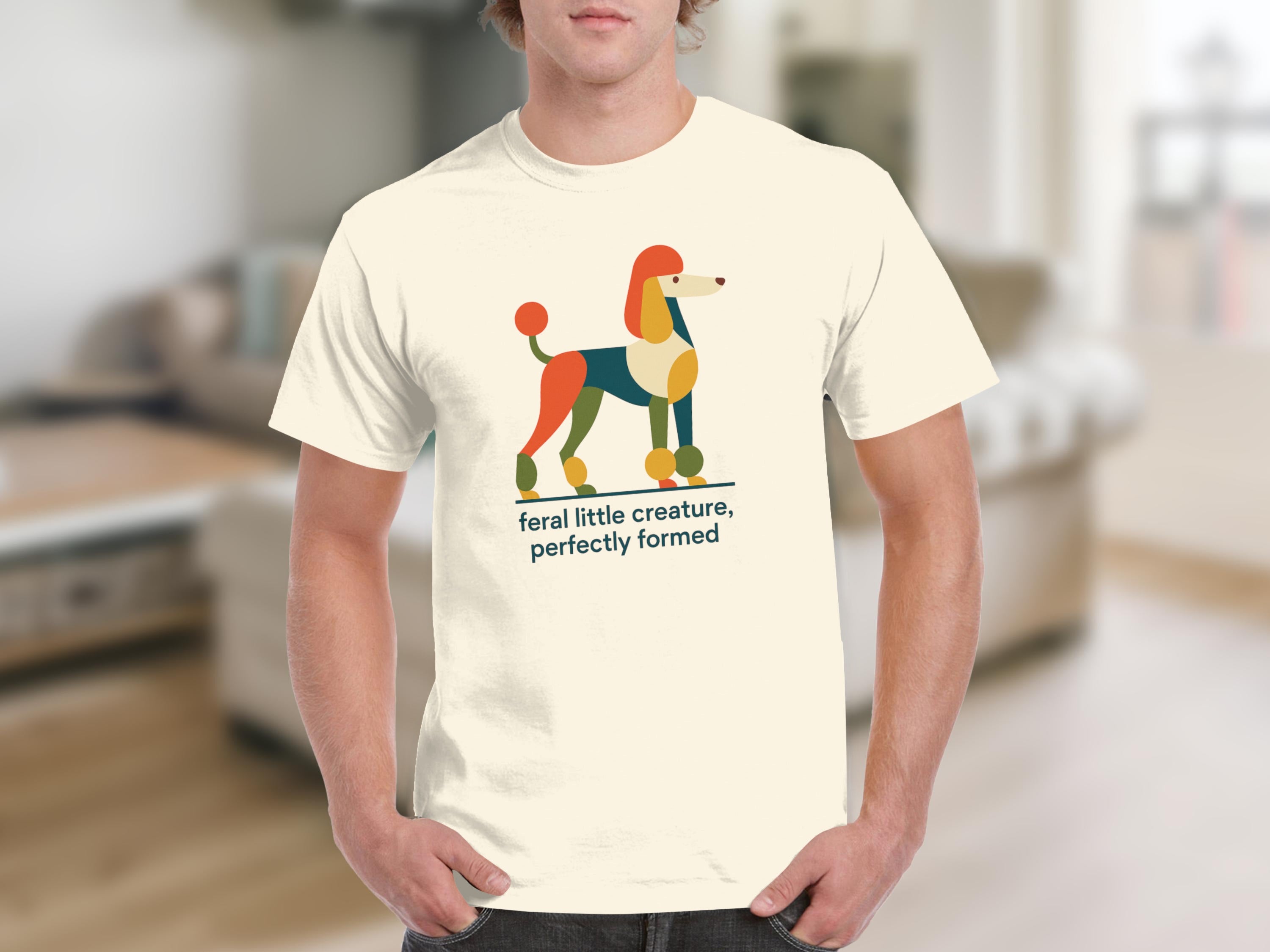 Cream t-shirt with colorful abstract poodle graphic and text.