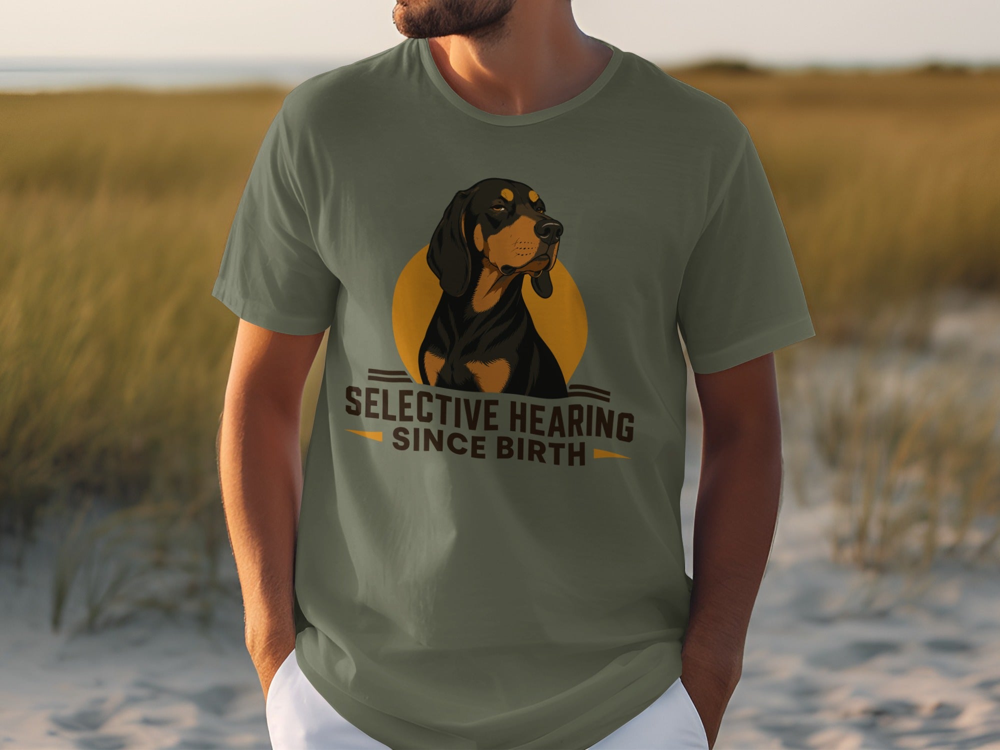 Olive green t-shirt with a dog graphic and "Selective Hearing Since Birth" text.