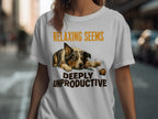 T-shirt with dog and text "RELAXING SEEMS DEEPLY UNPRODUCTIVE".