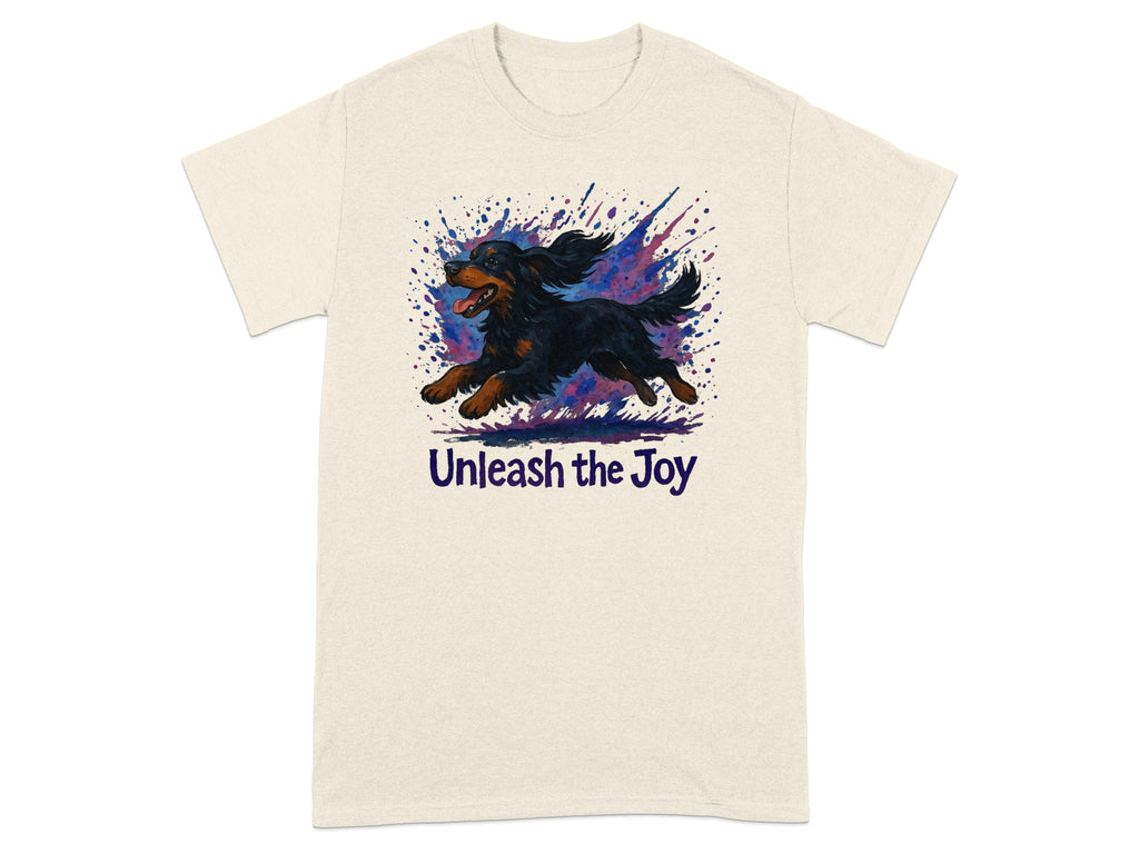 T-shirt with a black and tan dog running through a watercolor paint splash and the text "Unleash the Joy."