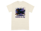 T-shirt with a black and tan dog running through a watercolor paint splash and the text "Unleash the Joy."