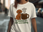 Brown Vizsla dog next to coffee cup with text "POWERED BY VIZSLA & COFFEE".