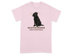 Light pink t-shirt with a black Labrador and the text "Selective Hearing Since Puppyhood".