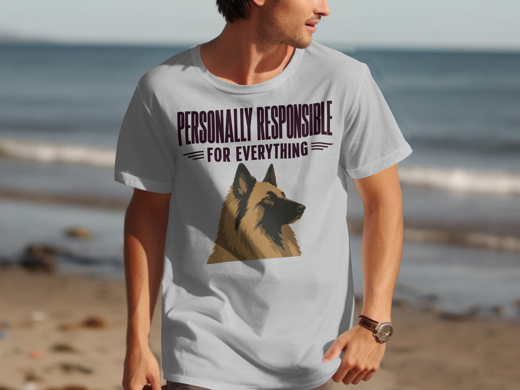 Man wearing grey t-shirt with "PERSONALLY RESPONSIBLE FOR EVERYTHING" and dog graphic.