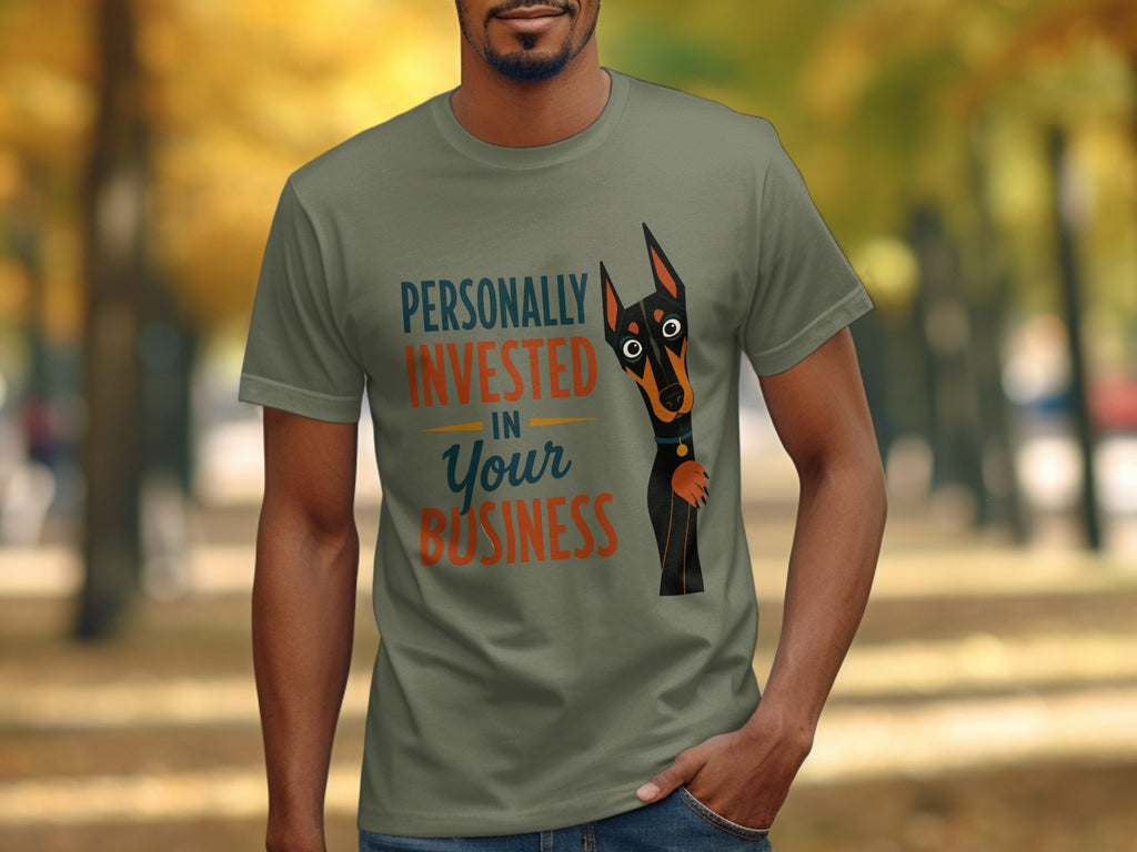 Green t-shirt with "Personally Invested in Your Business" and a dog.