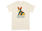 Cream t-shirt with abstract corgi graphic and text: "feral little creature, perfectly formed".