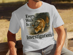 White t-shirt with a corgi wearing a detective hat and the text "Every Walk Is an Investigation."
