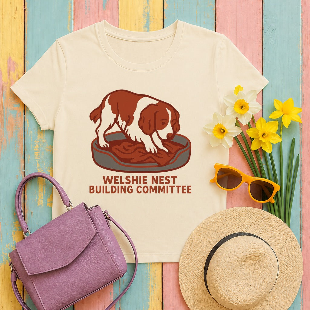 welsh-springer nest-building-committee tee flat lay hero v8