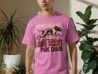 Pink t-shirt with "Powered by Bird Scent & Pure Chaos" and a dog running.