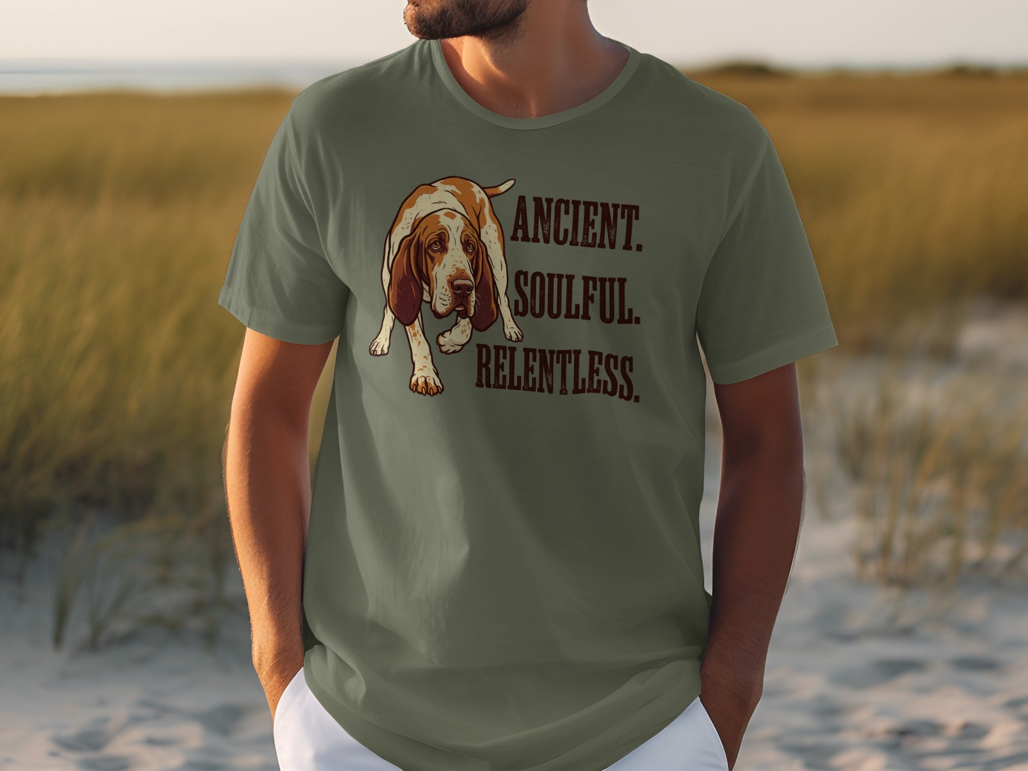 Olive green t-shirt with a dog and text ANCIENT. SOULFUL. RELENTLESS.