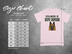 Gildan 5000 size chart with dog graphic wearing a shirt that says "Stillness is Deeply Suspicious."