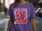 Purple t-shirt with pug graphic and text "First of all I'm a delight".