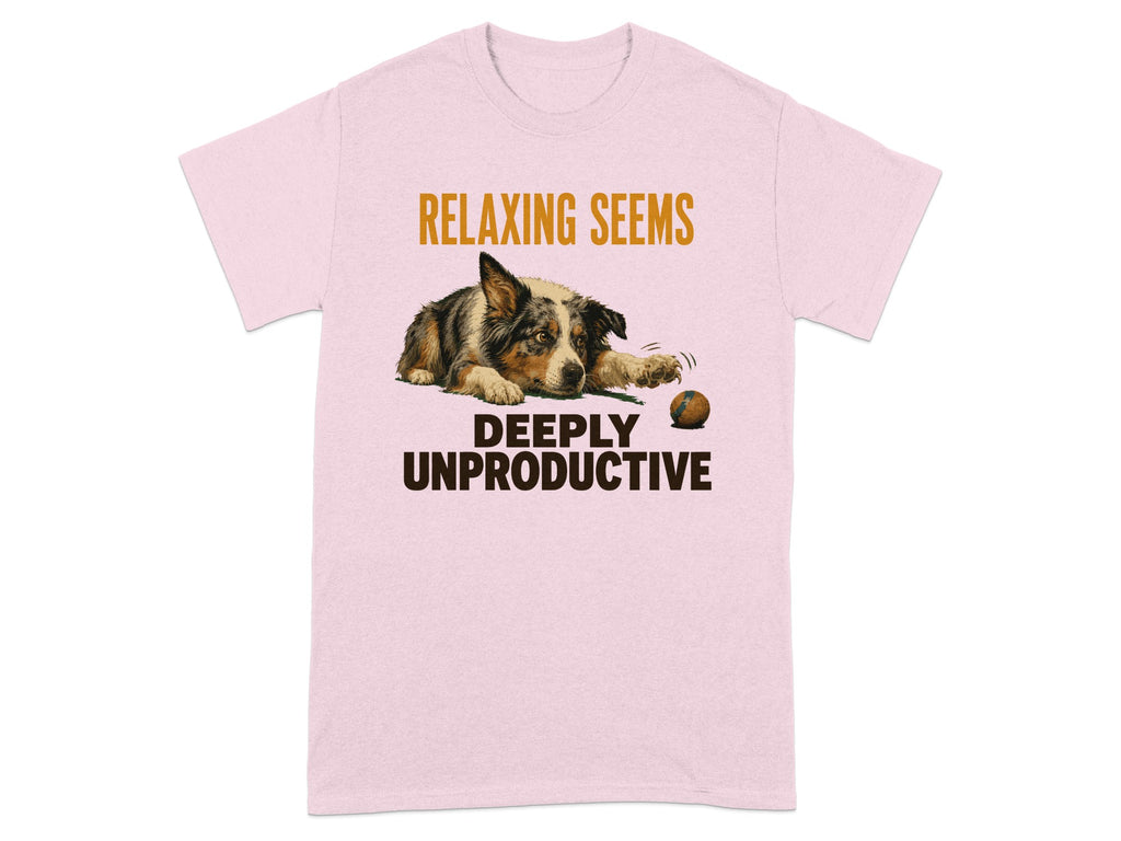 Pink t-shirt with a dog lying next to a ball, text reads "RELAXING SEEMS DEEPLY UNPRODUCTIVE".